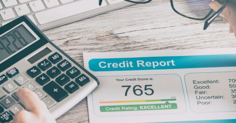 South African credit report overview with documents and graphs on a desk